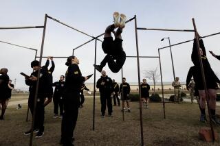 Army eases fitness test standards for women older troops AP News